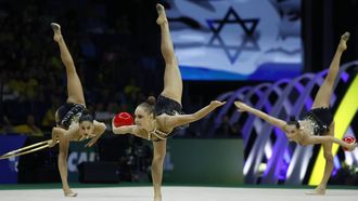 epa12320561 Gymnasts of team Israel compete in the hoop and ball category at the World Rhythmic Gymnastics Championships in Rio de Janeiro, Brazil, 24 August 2025.  EPA/Antonio Lacerda