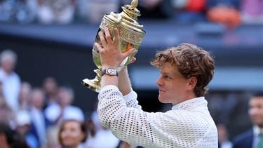 Italy's Jannik Sinner poses with the Gentleman's Singles trophy after his victory against Germany's Alexander Zverev at the end of their men's singles final tennis match on the last day of the 2026 Wimbledon Championships at The All England Lawn Tennis and Croquet Club in Wimbledon, southwest London, on July 12, 2026. 
Henry NICHOLLS / AFP