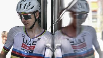 UAE Team Emirates - XRG team's Slovenian rider Tadej Pogacar casts a reflection as he disembarks his team bus during a training session two days prior to the start of the 113th edition of the Tour de France cycling race, in Castelldefels near Barcelona in northeastern Spain, on July 2, 2026. 
Jeff PACHOUD / AFP