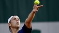 epa11376261 Tallon Griekspoor of the Netherlands serves during his Men's Singles 1st round match against Mackenzie Mcdonald of the USA at the French Open Grand Slam tennis tournament at Roland Garros in Paris, France, 28 May 2024.  EPA/YOAN VALAT
