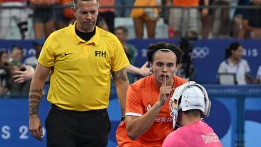 Netherlands' forward #51 Duco Telgenkamp celebrates in the face of Germany's goalkeeper #74 Jean-Paul Danneberg after the men's final field hockey match between Germany and the Netherlands during the Paris 2024 Olympic Games at the Yves-du-Manoir Stadium in Colombes on August 8, 2024. 
ARUN SANKAR / AFP