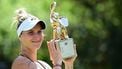 Winner Czech Republic's Marketa Vondrousova celebrates with the trophy after the women's single final match of the WTA tennis tournament in Berlin on June 22, 2025. 
Tobias SCHWARZ / AFP