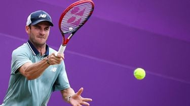 US player Tommy Paul returns against Italy's Lorenzo Musetti during their men's singles final tennis match on the last day of the Cinch ATP tennis Championships at Queen's Club in west London on June 23, 2024. 
HENRY NICHOLLS / AFP