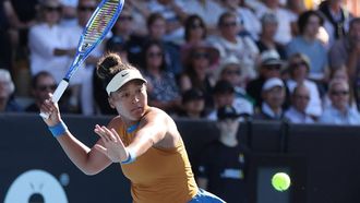 Naomi Osaka of Japan hits a return against Clara Tauson of Denmark during their women's singles final match at the WTA Auckland Classic tennis tournament in Auckland on January 5, 2025. 
Michael Bradley / AFP