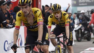 2023-09-13 17:27:14 Team Jumbo's Slovenian rider Primoz Roglic (L) crosses the finish line in first place followed by Team Jumbo-Visma's Danish rider Jonas Vingegaard during the stage 17 of the 2023 La Vuelta cycling tour of Spain, a 124,4 km race between Ribadesella and Alto de l'Angliru on September 13, 2023. 
MIGUEL RIOPA / AFP