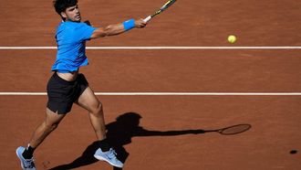 epa12889609 Carlos Alcaraz of Spain in action during his first round match against Otto Vortanen of Finland at the Barcelona Open tennis tournament in Barcelona, Spain, 14 April 2026.  EPA/Enric Fontcuberta