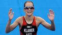 TOKIO - Rachel Klamer komt als vierde over de finish tijdens de olympische triatlon in het Odaiba Marine Park. ANP OLAF KRAAK