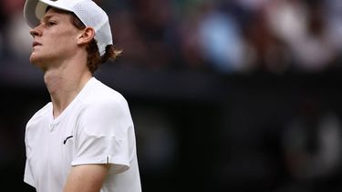 Italy's Jannik Sinner reacts after losing against Russia's Daniil Medvedev during their men's singles quarter-final tennis match on the ninth day of the 2024 Wimbledon Championships at The All England Lawn Tennis and Croquet Club in Wimbledon, southwest London, on July 9, 2024. Medvedev won the match 6-7, 6-4, 7-6, 2-6 6-3.
HENRY NICHOLLS / AFP