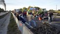 epa11151701 Demonstrators block the highway AP-7 in the village of Pontos (Girona) during the nineth-day of protests by farmers in Griona, Spain, 14 February 2024. Farmers protest against green measures planed by EU, in defense of fairer trade agreements and for aids to deal with any crisis like drought that affects the sector nowadays.  EPA/David Borrat