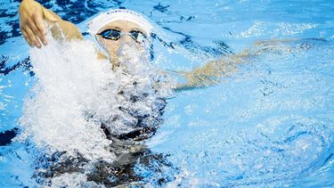 FUKUOKA - Kira Toussaint in actie op de finale 4 x 100 wissel vrouwen tijdens de achtste en tevens laatste dag van het WK Zwemmen in Japan. ANP KOEN VAN WEEL