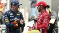Sprint race winner Ferrari's British driver Lewis Hamilton (R) speaks with third placed Red Bull Racing's Dutch driver Max Verstappen (L) after the sprint race of the Formula One Chinese Grand Prix at the Shanghai International Circuit in Shanghai on March 22, 2025. 
Greg Baker / AFP