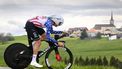epa11302946 Brandon McNulty from the United States of UAE Team Emirates in action during the third stage, a 15.51 km individual time trial with start and finish in Oron, of the 77th Tour de Romandie UCI World Tour Cycling race, Saint-Martin, Switzerland, 26 April 2024.  EPA/JEAN-CHRISTOPHE BOTT