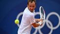 Individual Neutral Athlete Daniil Medvedev returns to Canada's Felix Auger-Aliassime during their men's singles third round tennis match on Court Simonne-Mathieu at the Roland-Garros Stadium during the Paris 2024 Olympic Games, in Paris on July 31, 2024.  
MARTIN BERNETTI / AFP