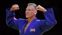 Netherlands' Frank de Wit (blue) celebrates during the bronze match against Japan's Sotaro Fujiwara (unseen) of the men's -81kg category during the 2021 Judo World Championships at 'Papp Laszlo' Arena in Budapest, Hungary, on June 9, 2021. 
Attila KISBENEDEK / AFP