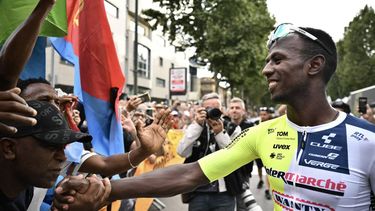 Intermarche - Wanty team's Eritrean rider Biniam Girmay celebrates with supporters after winning the 3rd stage of the 111th edition of the Tour de France cycling race, 230,5 km between Piacenza and Turin, in Italy, on July 1, 2024. 
Marco BERTORELLO / AFP