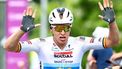 Soudal Quick-Step's Belgian rider Tim Merlier celebrates as he crosses the finish line of stage 5, the last stage of the Baloise Belgium Tour cycling race, from and to Brussels (183,2 km), on June 22, 2025. 
DAVID PINTENS / Belga / AFP