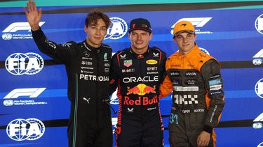 2023-10-06 21:10:06 epa10904101 Dutch Formula One driver Max Verstappen (C) of Red Bull Racing poses after taking the pole position with second position British Formula One driver George Russell (L) of Mercedes-AMG Petronas and Australian driver OScar Piastri of McLaren, after the qualifying session for the Formula 1 Qatar Grand Prix in Lusail, Qatar, 06 October 2023. The Formula 1 Qatar Grand Prix will be held on 08 October 2023.  EPA/ALI HAIDER