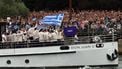 Athletes from Greece's delegation sail in a boat along the river Seine at the start of the opening ceremony of the Paris 2024 Olympic Games in Paris on July 26, 2024. 
Emmanuel DUNAND / AFP