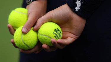 epa10747921 Tennis balls during the Women's Singles final match Ons Jabeur of Tunisia against Marketa Vondrousova of Czech Republic at the Wimbledon Championships, Wimbledon, Britain, 15 July 2023.  EPA/NEIL HALL   EDITORIAL USE ONLY