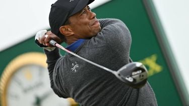US golfer Tiger Woods watches his drive from the 13th tee on the opening day of the 152nd British Open Golf Championship at Royal Troon on the south west coast of Scotland on July 18, 2024. 
Glyn KIRK / AFP