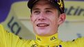 2023-07-15 19:04:50 Jumbo-Visma's Danish rider Jonas Vingegaard celebrates on the podium with the overall leader's yellow jersey after the 14th stage of the 110th edition of the Tour de France cycling race, 152 km between Annemasse and Morzine Les Portes du Soleil, in the French Alps, on July 15, 2023. 
Thomas SAMSON / AFP