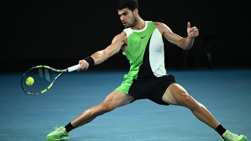 epa12684495 Carlos Alcaraz of Spain in action during his Men's Singles quarter-finals match against Alex de Minaur of Australia at the Australian Open tennnis tournament in Melbourne, 27 January 2026.  EPA/JOEL CARRETT  AUSTRALIA AND NEW ZEALAND OUT