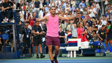 Spain's Carlos Alcaraz celebrates after winning his men's singles round of 16 tennis match against France’s Arthur Rinderknech on day eight of the US Open tennis tournament at the USTA Billie Jean King National Tennis Center in New York City, on August 31, 2025. 
ANGELA WEISS / AFP