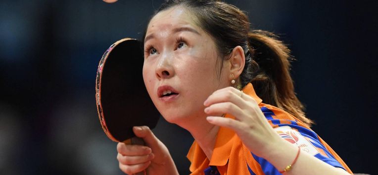 Netherlands' Jie Li serves the ball to Hungary's Bernadett Balint (unseen) on April 23, 2019 during their women's single match at the Liebherr 2019 ITTF World Table Tennis Championships in Budapest, Hungary. 
ATTILA KISBENEDEK / AFP