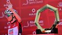 UAE Team Emirates' Slovenian rider Tadej Pogacar waves on stage ahead of the seventh stage of the UAE Tour cycling race from Hazza Bin Zayed Stadium to Jebel Hafeet in the United Arab Emirates, on February 23, 2025. 
Giuseppe CACACE / AFP