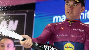 Lidl-Trek's Danish rider Mads Pedersen celebrates the Cyclamen Jersey on the podium of the 12th stage of the 108th Giro d'Italia cycling race of 172kms from Modena to Viadana on May 22, 2025. 
Luca Bettini / AFP