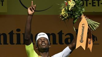 Intermarche - Wanty team's Eritrean rider Biniam Girmay celebrates on the podium after winning the 12th stage of the 111th edition of the Tour de France cycling race, 203,6 km between Aurillac and Villeneuve-sur-Lot, southwestern France, on July 11, 2024. 
Marco BERTORELLO / AFP