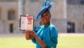 President of Commonwealth Games England, Denise Lewis poses with their medal and insignia after being appointed a Dame Commander of the Order of the British Empire (DBE) during an investiture ceremony at Windsor Castle, on June 14, 2023. 
Andrew Matthews / POOL / AFP