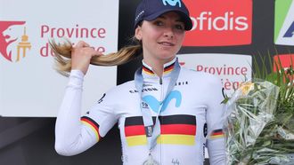 2023-04-19 13:04:49 epa10579871 Second placed Liane Lippert of Germany, Movistar Team, poses during the podium ceremony after the Women's Fleche Wallonne cycling race of 127,3 km in Huy, Belgium, 19 April 2023.  EPA/OLIVIER MATTHYS