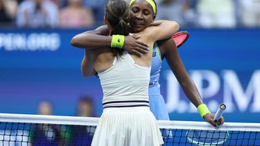 USA's Emma Navarro (L) hugs USA's Coco Gauff after winning their women's singles round of 16 tennis match on day seven of the US Open tennis tournament at the USTA Billie Jean King National Tennis Center in New York City, on September 1, 2024. 
CHARLY TRIBALLEAU / AFP