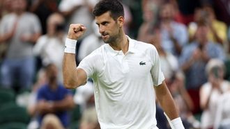 2023-07-07 22:46:46 epa10733308 Novak Djokovic of Serbia reacts against Stan Wawrinka of Switzerland in their Men's Singles match at the Wimbledon Championships, Wimbledon, Britain, 07 July 2023.  EPA/NEIL HALL   EDITORIAL USE ONLY