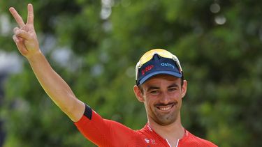 2023-07-23 20:05:12 Lotto Dstny's Belgian rider Victor Campenaerts celebrates on the podium with most combative rider's award after the 21st and final stage of the 110th edition of the Tour de France cycling race, 115 km between Saint-Quentin-en-Yvelines and the Champs-Elysees in Paris, on July 23, 2023. 
Thomas SAMSON / AFP