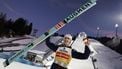 epa11801629 First placed Daniel Tschofenig of Austria cheers with the trophy after the second stage of the 73rd Four Hills Ski Jumping Tournament in Garmisch-Partenkirchen, Germany, 01 January 2025.  EPA/ANNA SZILAGYI