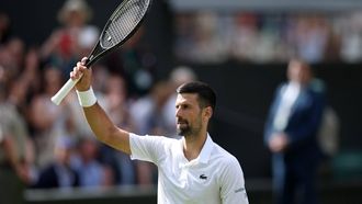 epa11457472 Novak Djokovic of Serbia gestures to the crowd after winning against Jacob Fearnley of Britain (unseen) in their Men's 2nd round match at the Wimbledon Championships, in Wimbledon, London, Britain, 04 July 2024.  EPA/ADAM VAUGHAN   EDITORIAL USE ONLY