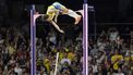 epa11528837 Armand Duplantis of Sweden clears the bar at 6.25m to set a new world record in the Men Pole Vault final of the Athletics competitions in the Paris 2024 Olympic Games, at the Stade de France stadium in Saint Denis, France, 05 August 2024.  EPA/RONALD WITTEK