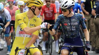 epa11472096 Yellow jersey Slovenian rider Tadej Pogacar (L) of UAE Team Emirates and Danish rider Jonas Vingegaard of Team Visma Lease a Bike bump fists as they stand at the start line of the 12th stage of the 2024 Tour de France cycling race over 203km from Aurillac to Villeneuve-sur-Lot, France, 11 July 2024.  EPA/GUILLAUME HORCAJUELO