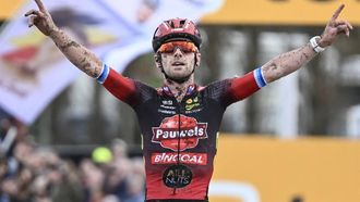 2023-10-28 02:00:00 Belgian rider Eli Iserbyt celebrates as he crosses the finish line to win the men elite race of the Cyclocross Ruddervoorde in Oostkamp on October 28, 2023. 
Tom Goyvaerts / Belga / AFP