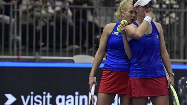 2023-11-10 20:09:38 Czech Republic's Barbora Krejcikova (R) and Katerina Siniakova talk together as they play against US Sloane Stephens and Taylor Townsend during the group stage group A doubles tennis match between Czech Republic and USA on the day 4 of the Billie Jean King Cup Finals 2023 in La Cartuja stadium in Seville on November 10, 2023. 
CRISTINA QUICLER / AFP