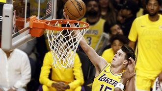 epa10949866 Los Angeles Lakers guard Austin Reaves scores during the first quarter of the NBA basketball game between the Orlando Magic and Los Angeles Lakers at Crypto.com Arena in Los Angeles, California, USA, 30 October 2023.  EPA/ETIENNE LAURENT SHUTTERSTOCK OUT