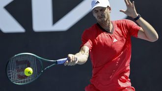 epa11822916 Hubert Hurkacz of Poland in action against Tallon Griekspoor of the Netherlands during their Men's first round match during the Australian Open tennis tournament in Melbourne, Australia, 14 January 2025.  EPA/ROLEX DELA PENA