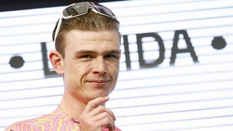 epa11234038 Dutch rider Marijn Van den Berg of EF Education First - Easypoint celebrates on the podium after winning the fourth stage of the Volta Ciclista a Catalunya, a cycling race over 169km from Sort to Lleida, Catalonia, Spain, 21 March 2024.  EPA/Quique Garcia