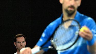 epa11835972 Coach Andy Murray of Great Britain looks on as Novak Djokovic of Serbia serves against Jiri Lehecka of the The Czech Republic during their round four match at the Australian Open tennis tournament in Melbourne, Australia, 19 January 2025.  EPA/LUKAS COCH AUSTRALIA AND NEW ZEALAND OUT