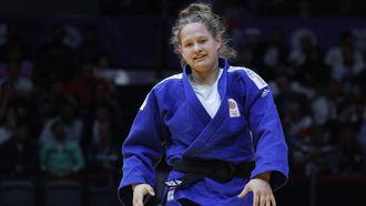 Netherland's Joanne van Lieshout reacts as she competes in the women's -63kg bronze medal bout at the World Judo Championship in Doha on May 10, 2023. 
KARIM JAAFAR / AFP