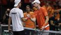 Botic Van de Zandschulp of Team Netherlands (R) shakes hands with Daniel Altmaier of Team Germany after winning their semi-final singles match between Germany and Netherlands at the Davis Cup Finals at the Palacio de Deportes Jose Maria Martin Carpena arena in Malaga, southern Spain, on November 22, 2024. 
Thomas COEX / AFP