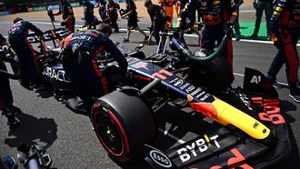 2023-07-09 14:17:27 epa10736129 Mechanics prepare the racing car of Mexican Formula One driver Sergio Perez of Red Bull Racing prior to the Formula One British Grand Prix 2023, at the Silverstone Circuit race track in Silverstone, Britain, 09 July 2023.  EPA/CHRISTIAN BRUNA