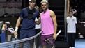 epa12462998 Carlos Alcaraz (R) of Spain and Jannik Sinner of Italy pose at the net before the final of the 2025 Six Kings Slam tennis tournament in Riyadh, Saudi Arabia, 18 October 2025.  EPA/STR